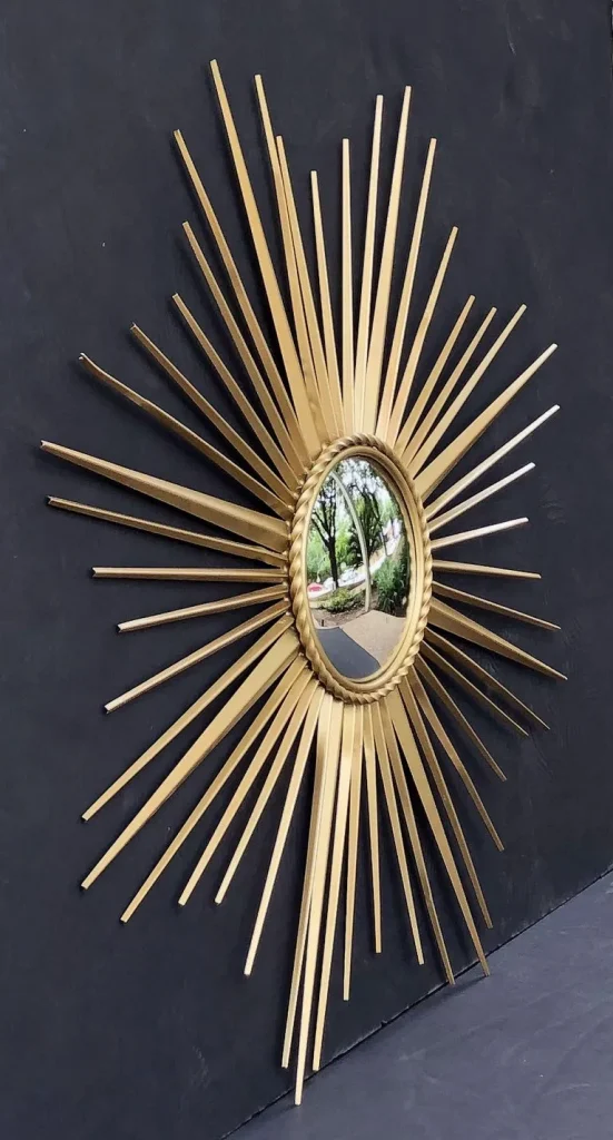Miroir en metal dore Sunburst ou Starburst de Chaty Vallauris